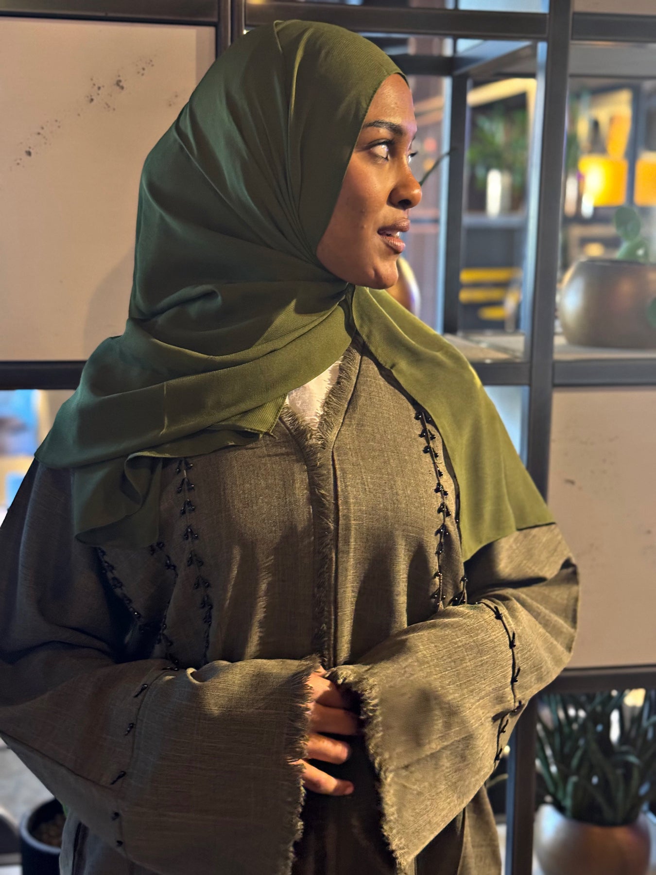 Olive Green Frayed Embellished Closed Abaya with Pockets and Hijab | AbayaTopia Olive Green Frayed Embellished Closed Abaya with Pockets and Hijab | AbayaTopia
